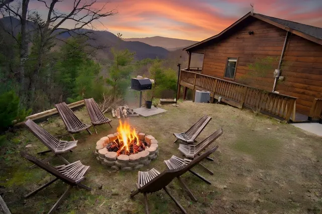 Fire pit with mountain views at the cabin