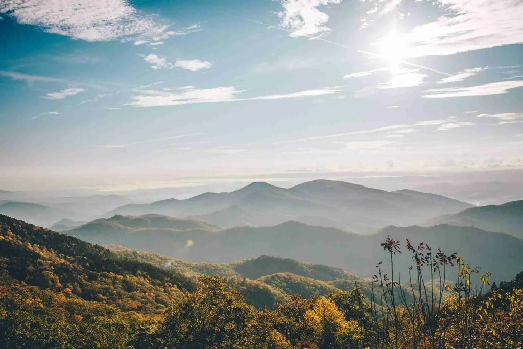 Sunlight over layered mountain ridges in the Great Smoky Mountains