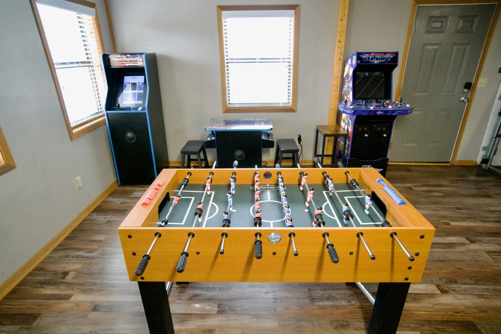 Foosball table and 3 arcades