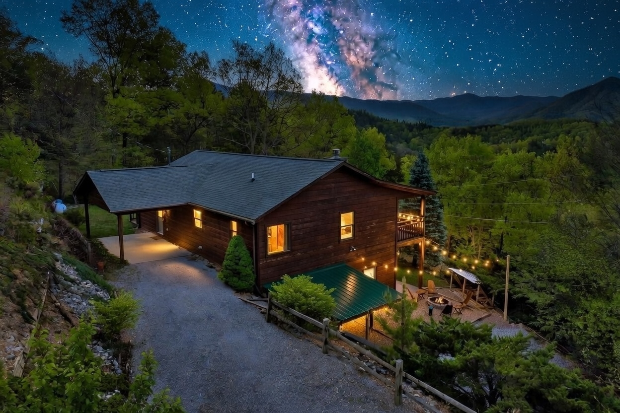 Smoky Mountains Lodge cabin at night with panoramic mountain views in Wears Valley, Tennessee