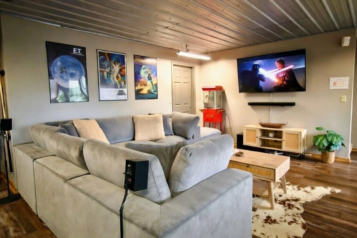 Dedicated movie room with Dolby surround sound and popcorn machine at Smoky Mountains Lodge