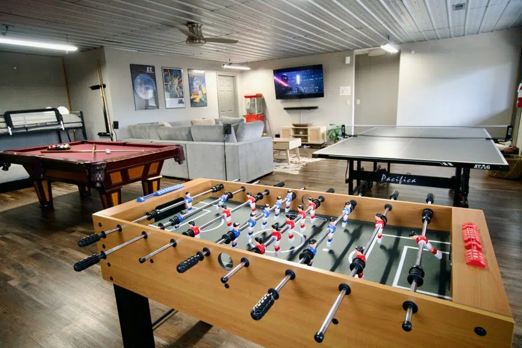900sq ft game room with foosball, ping pong, and pool